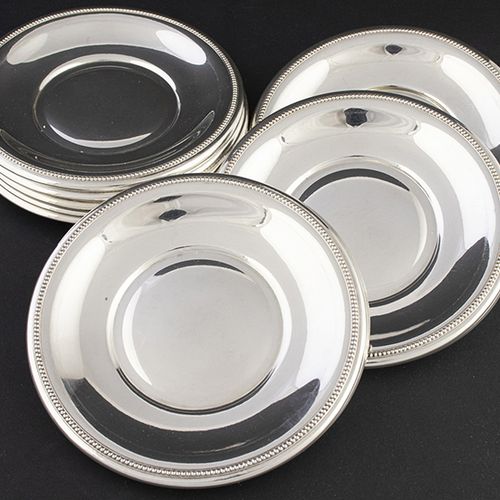Null Silver objects - Miscellaneous - Twelve silver plates with beaded borders, &hellip;