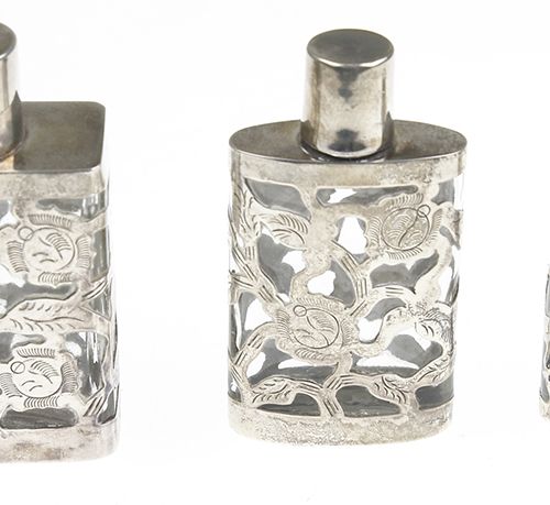 Null Silver objects - Miscellaneous - Three silver mounted glass perfume bottles&hellip;