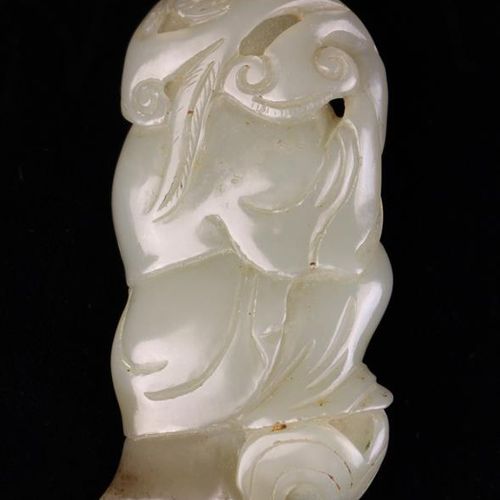 Null A Fine Qing Period Celadon Jade Carving of a Boy with Fish, with brown incl&hellip;