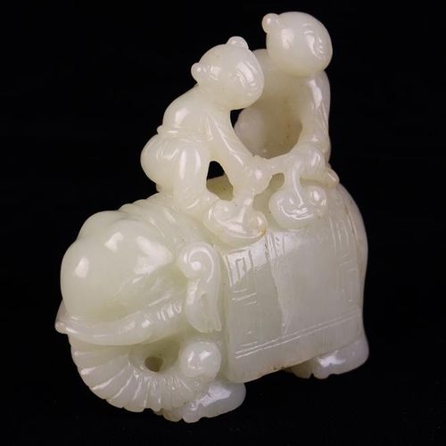 Null A Qing Period Pale Celadon Jade Carving of He-he Twins on the back of an el&hellip;