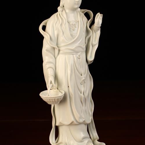 Null Blanc de Chine Figure d'une Guanyin déguisée en poissonnière portant un pan&hellip;