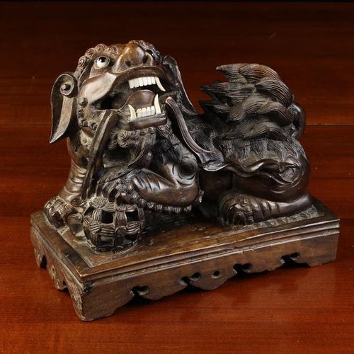 Null A 19th Century Oriental Carved Hardwood Kylin with glass inset eyes and bon&hellip;
