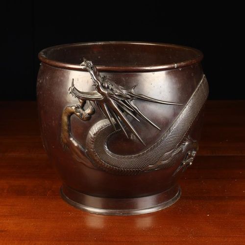 Null A Large Late 19th Century Bronze Jardiniere with a scrolling dragon entwine&hellip;