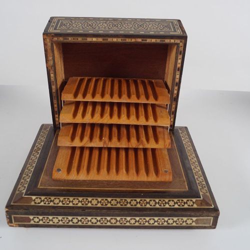 OTTOMAN MUSICAL CIGAR BOX 奥托曼音乐烟盒 硬木和微嵌，长方形。高10厘米；宽22厘米；深20厘米。