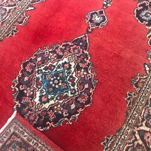 LARGE KASHAN RUG Red ground, pole medallion enclosed by a navy border. Dimension&hellip;