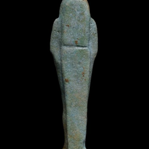 Null 古代埃及的信仰USHABTICa.公元前664-525年。 
一个古埃及殡葬雕像，木乃伊形状的身体和背柱站在一个小底板上。模特化的细节，戴着可见耳朵的&hellip;