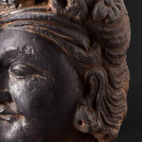 GANDHARAN DARK SCHIST HEAD OF BODHISATTVA Ca. 200-300 AD. 
A carved dark schist &hellip;