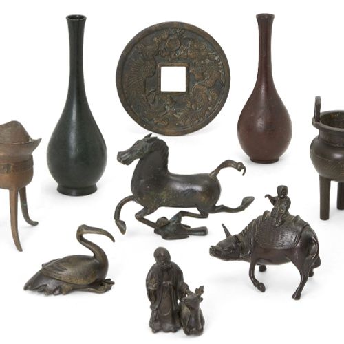 Null A group of nine Chinese and Japanese small bronzes, late Ming dynasty-20th &hellip;