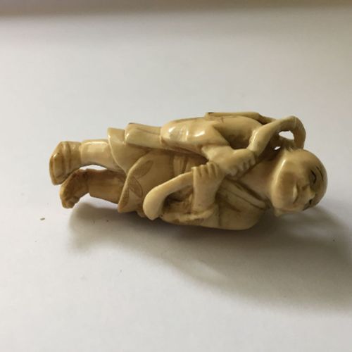 Null A collection of eleven ivory and horn Japanese netsuke, 19th century, to in&hellip;