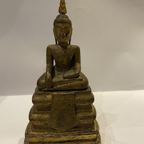 Null A Cambodian gilded wood seated Buddha, 19th century, 31cm high



Provenanc&hellip;