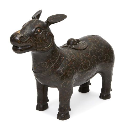 Null 
A rare Chinese gold and silver inlaid bronze tapir-form ritual vessel, zun&hellip;
