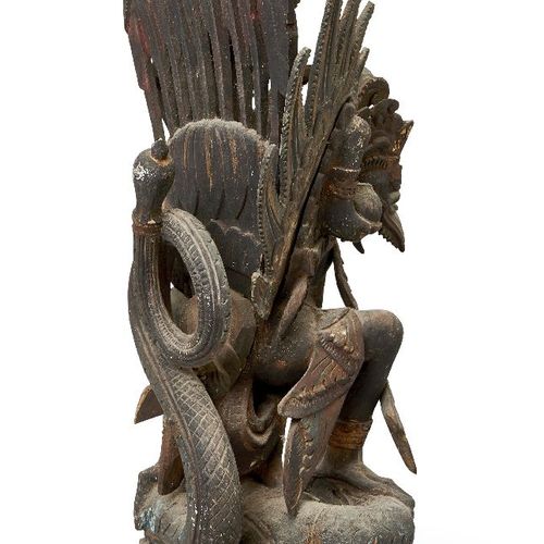 Null A Balinese wood carving, early 20th century, carved as a wing deity attacki&hellip;
