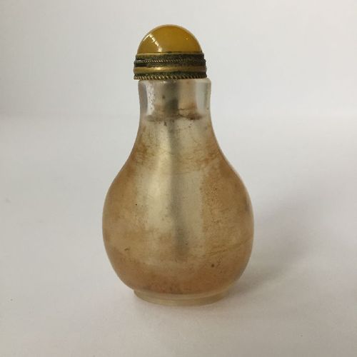 Null A Chinese rock crystal snuff bottle, 19th century, carved with a seated sch&hellip;