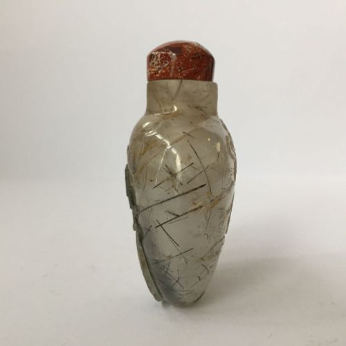 Null An unusual Chinese hair crystal snuff bottle carved with a relief Buddhist &hellip;