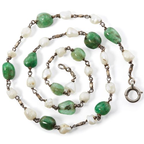Null 一条南印度绿宝石和珍珠项链，19世纪，淡水珍珠和绿宝石之间有银链链接，长48厘米，重19克

请参考部门的状况报告。