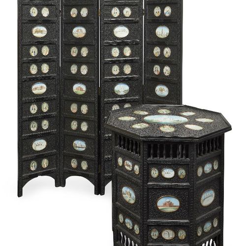Null A finely carved ebony four-fold screen and occasional table, North India, s&hellip;