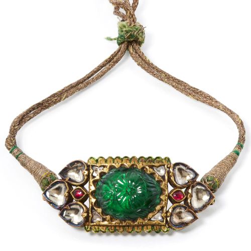 Null An emerald and diamond-set enamelled gold bazuband by repute from the colle&hellip;