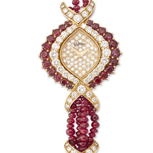 Null Delaneau. An 18ct gold, ruby, diamond and cultured pearl bracelet watch 
Ci&hellip;