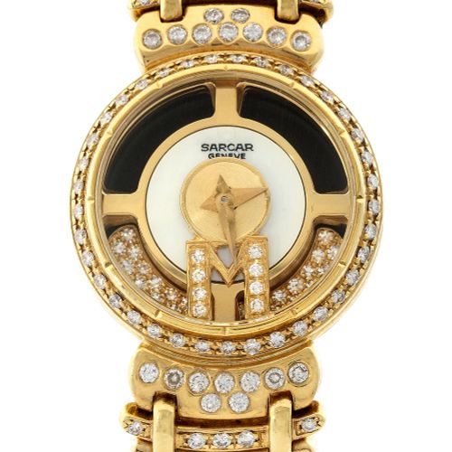 Null Sarcar. A lady's 18ct gold and diamond set bracelet watch with mystery styl&hellip;