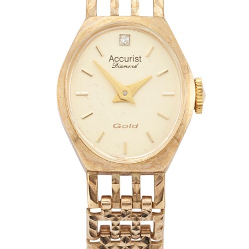 Null Accurist. A 9ct gold quartz bracelet watch 
'Accurist Diamond', import mark&hellip;