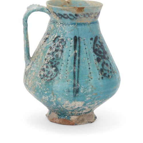 Null Une cruche à pied en poterie à glaçure turquoise de Kashan,

Kashan, Perse &hellip;