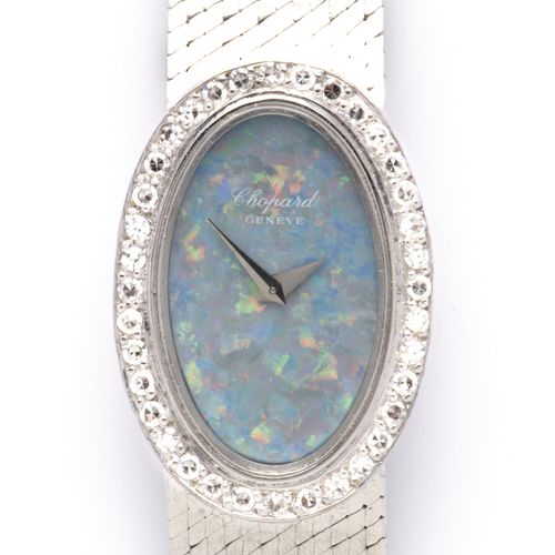 An 18k white gold bracelet watch with opal dial, by Chopard 萧邦制作的18K白金手镯表，带蛋白石表盘&hellip;