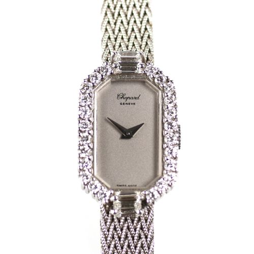 An 18k white gold lady's diamond bracelet watch, by Chopard 萧邦18K白金女士钻石手镯表，机械机芯，&hellip;
