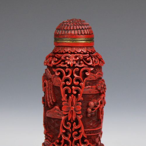 Four Chinese carved cinnabar lacquer snuff bottles Quatre tabatières chinoises s&hellip;