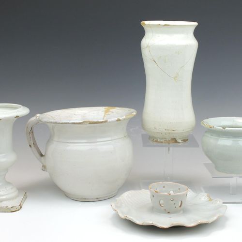 A group of white Delft faience including an albarello and a trembleuse A group o&hellip;
