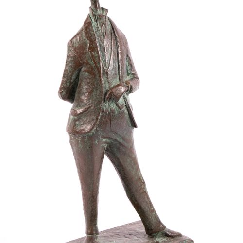 A bronze statue of a man wearing a Jaeger-LeCoultre Reverso Classique A bronze s&hellip;