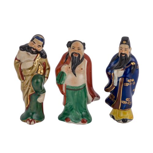 Drei Unsterbliche aus Porzellan. CHINA, 20. Jh.. Trois immortels en porcelaine, &hellip;