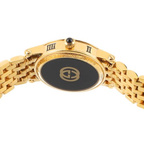 GUCCI VINTAGE Armbanduhr. GUCCI VINTAGE watch.Gold-coloured model with Roman num&hellip;