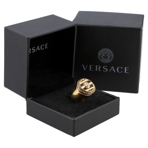 VERSACE Siegelring, NP.: 190,-€. VERSACE签名戒指，零售价：190,-欧元。金色的模型，有蜿蜒的设计和美杜莎头。附上盒子和&hellip;