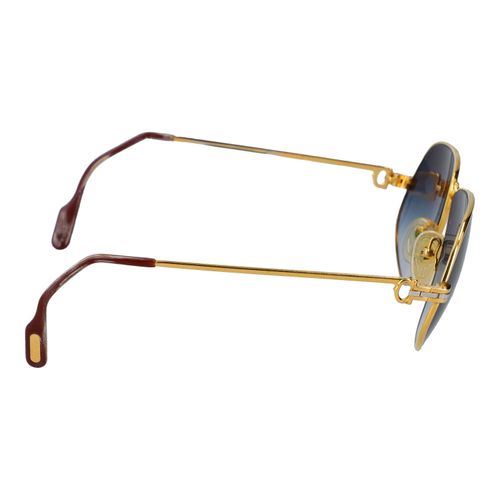 Null 卡地亚复古眼镜 "MUST DE CARTIER 140"。金色的框架，有强烈的岁月痕迹。有色镜片，带斜视。案件和文件附在后面。强烈的岁月痕迹。