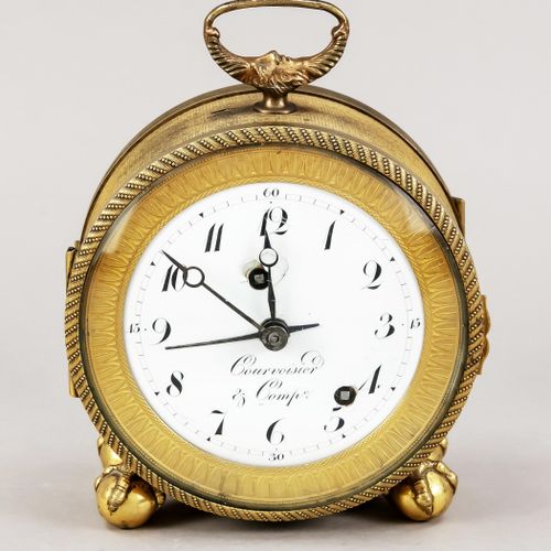 Null fire gilded table clock in alarm form, marked Courvoisier & Comp., around 1&hellip;