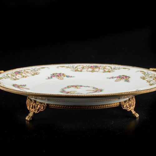 Limoges centerpiece in porcelain with painted floral motifs, with gilt bronze de&hellip;