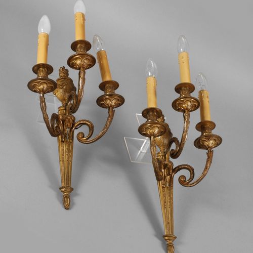 Null 
Pair of wall lamps
Early 20th c., gilded bronze, neoclassical appliqués wi&hellip;