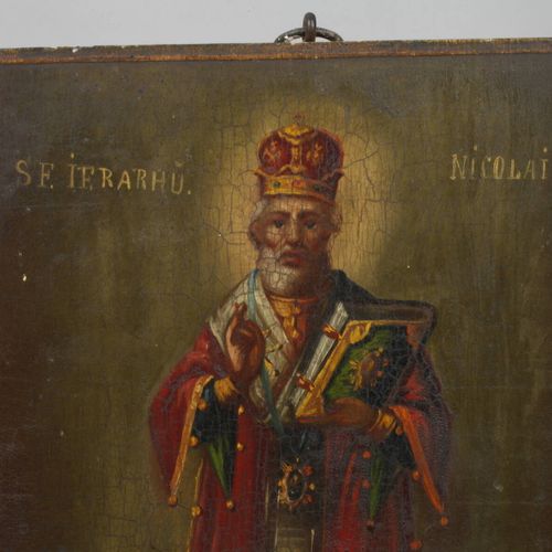 Null 
圣尼古拉斯的图标
俄罗斯，20世纪，以教会斯拉夫语标示，在简单封锁的硬木板上的蛋彩画，描绘了圣尼古拉作为一个完整的人物与圣经的祝福姿态，油漆爆裂，裂&hellip;