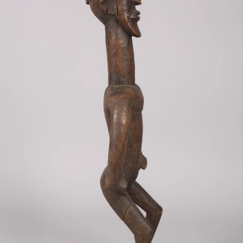 Null 
Figure d'ancêtre mossi
Burkina Faso, 20e s., bois dur sculpté et teinté en&hellip;