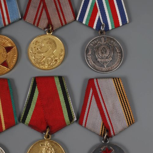 Null 
Mixed lot of Russian awards
15 pieces, among them medal for 50-, 70-, 80-,&hellip;