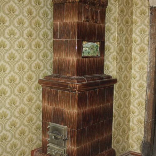 Null 
Art Nouveau tiled stove
German, circa 1900, tiles with brown running glaze&hellip;