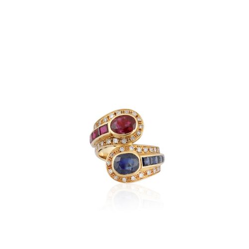 ANELLO yellow gold contrarié with oval ruby and sapphire flanked respectively by&hellip;