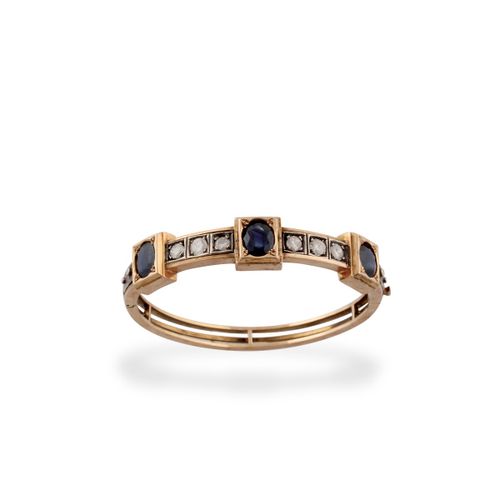 BRACCIALE rigid in yellow gold and silver with three oval sapphires in a line in&hellip;