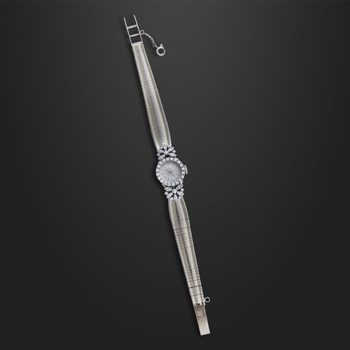 PATEK PHILIPPE 18K白金和钻石女装腕表，配金质表带。约1950年制造 无功能的DIAM：16毫米