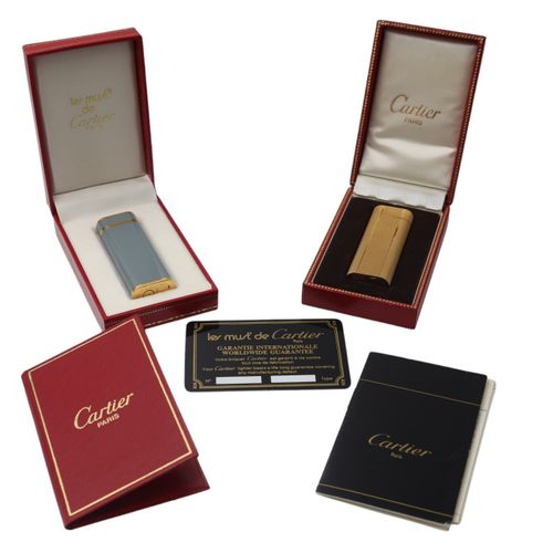 A collection of Cartier Lighters Un lot comprenant 2 briquets Cartier, y compris&hellip;
