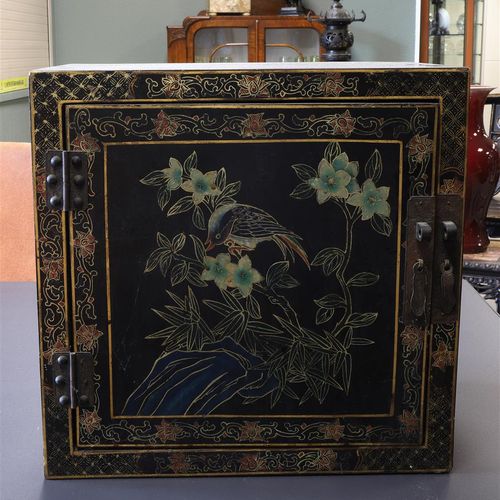 Null A black lacquer cabinet, China 20th century, h37.5 x w 38 x d 25 cm.