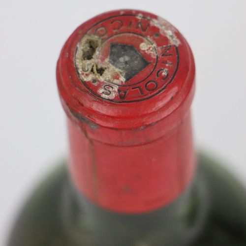 Null CHATEAU BRANE CANTENAC.

Millésime : 1962.

1 bouteille, e.T.A., e.