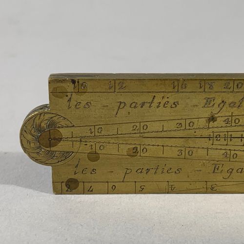 Null François Menant (1741-1793)
Compas de proportion en laiton doré, 
Comportan&hellip;