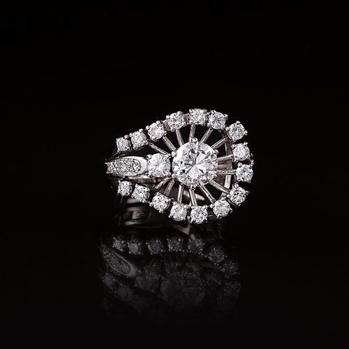 A Fine Diamond Solitaire Ring with Diamonds. Around 1960/70. 18 ct. White gold, &hellip;