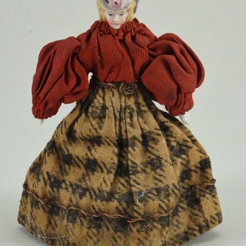A miniature Parian- type shoulder head doll with moulded bonnet, German circa 18&hellip;